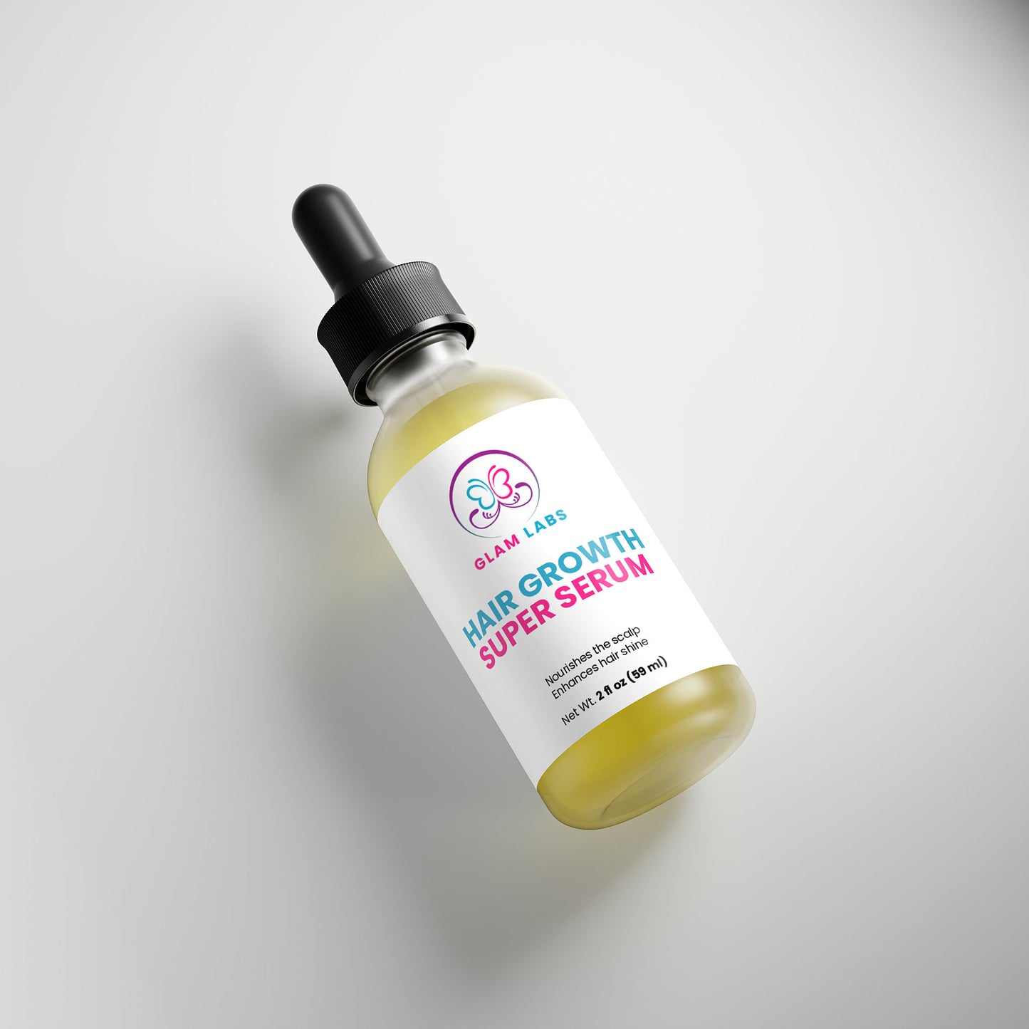 Glam Labs dropper bottle of Hair Growth Super Serum with yellow oil formula angled on white background
